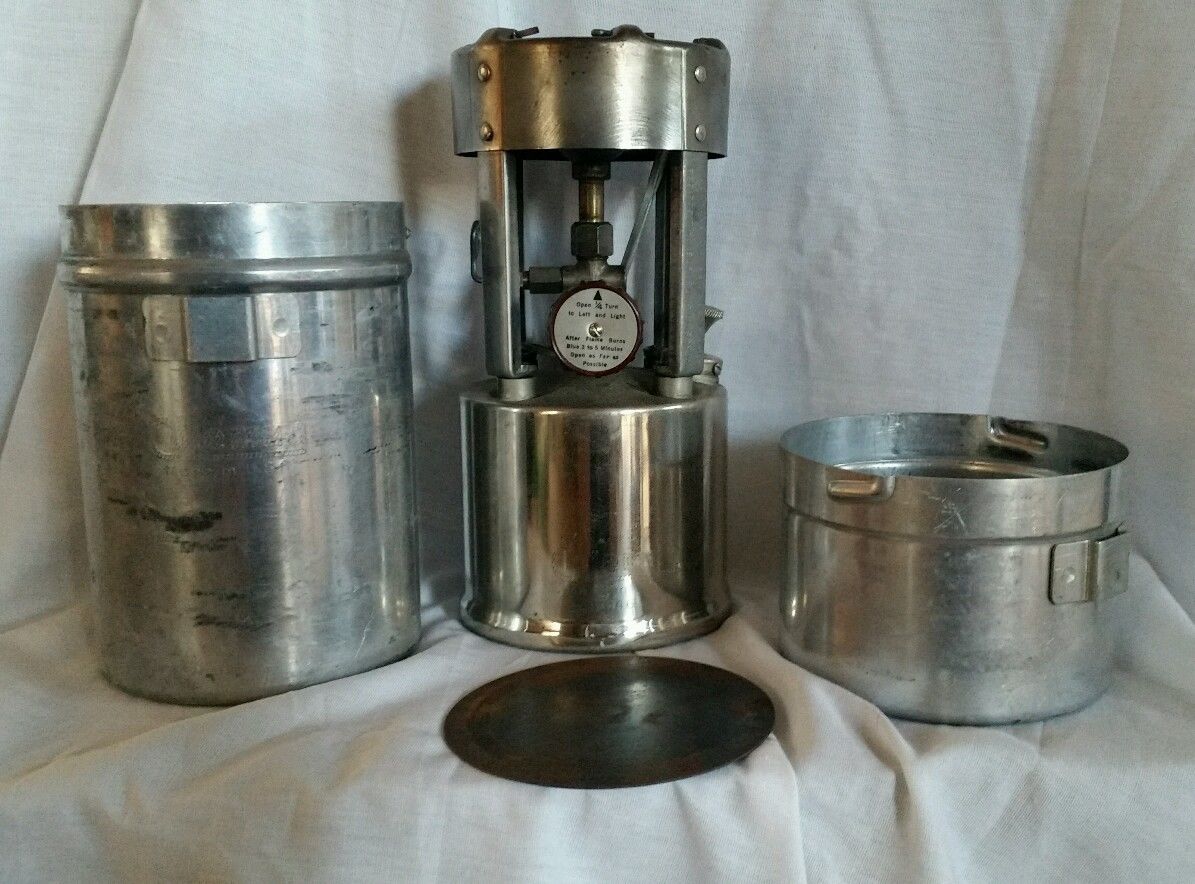 Post War G.I. Pocket Stove dated 1946. Nickel or chrome plated font or tank. No legs. The small part of the can had a loop for the wrench which made a nice cool handle Post War G.I. Pocket Stove dated 1946. Nickel or chrome plated font or tank. No legs. The small part of the can had a loop for the wrench which made a nice cool handle